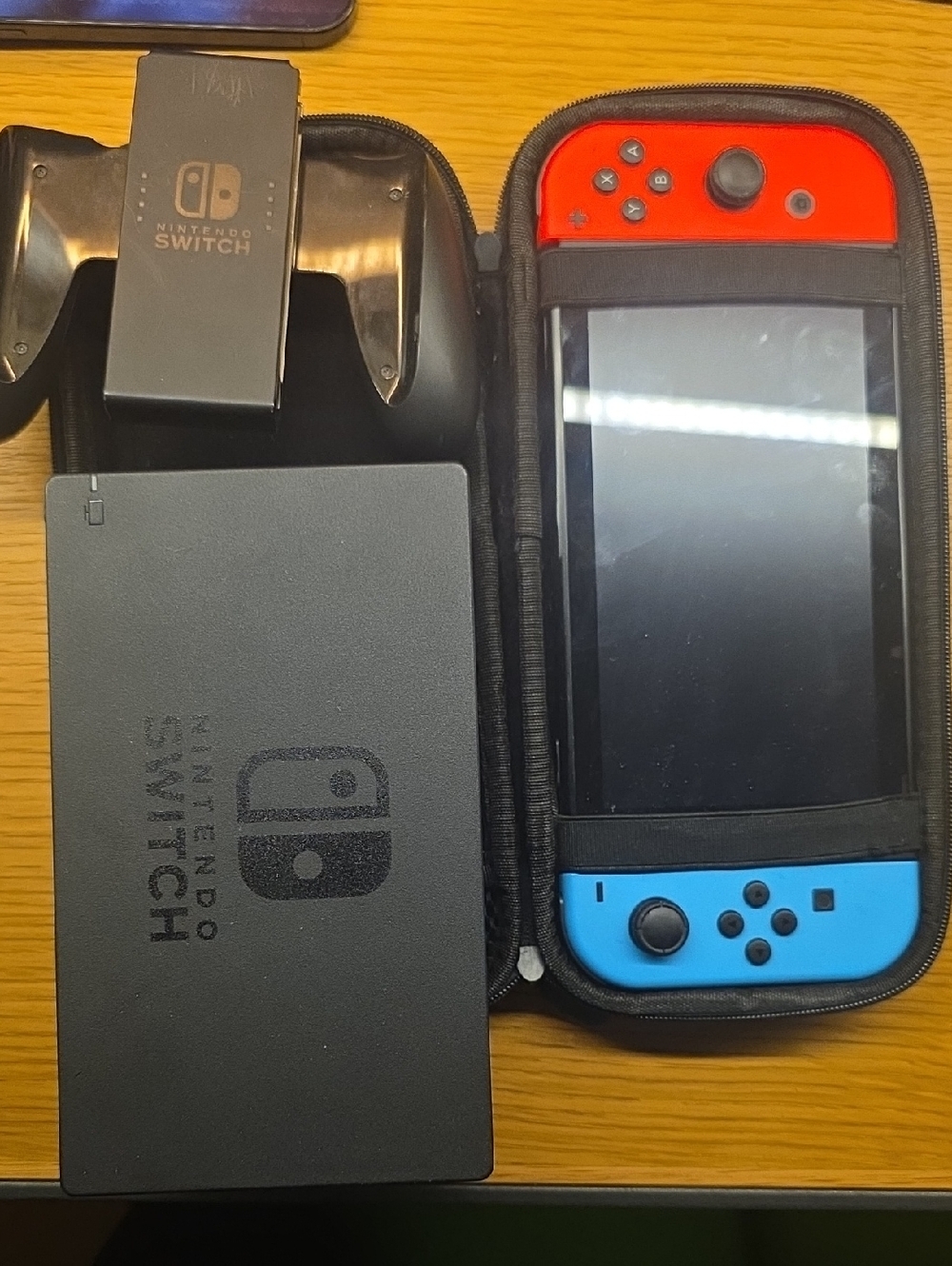 Nintendo Switch with Red and Blue Joy-Con Controllers